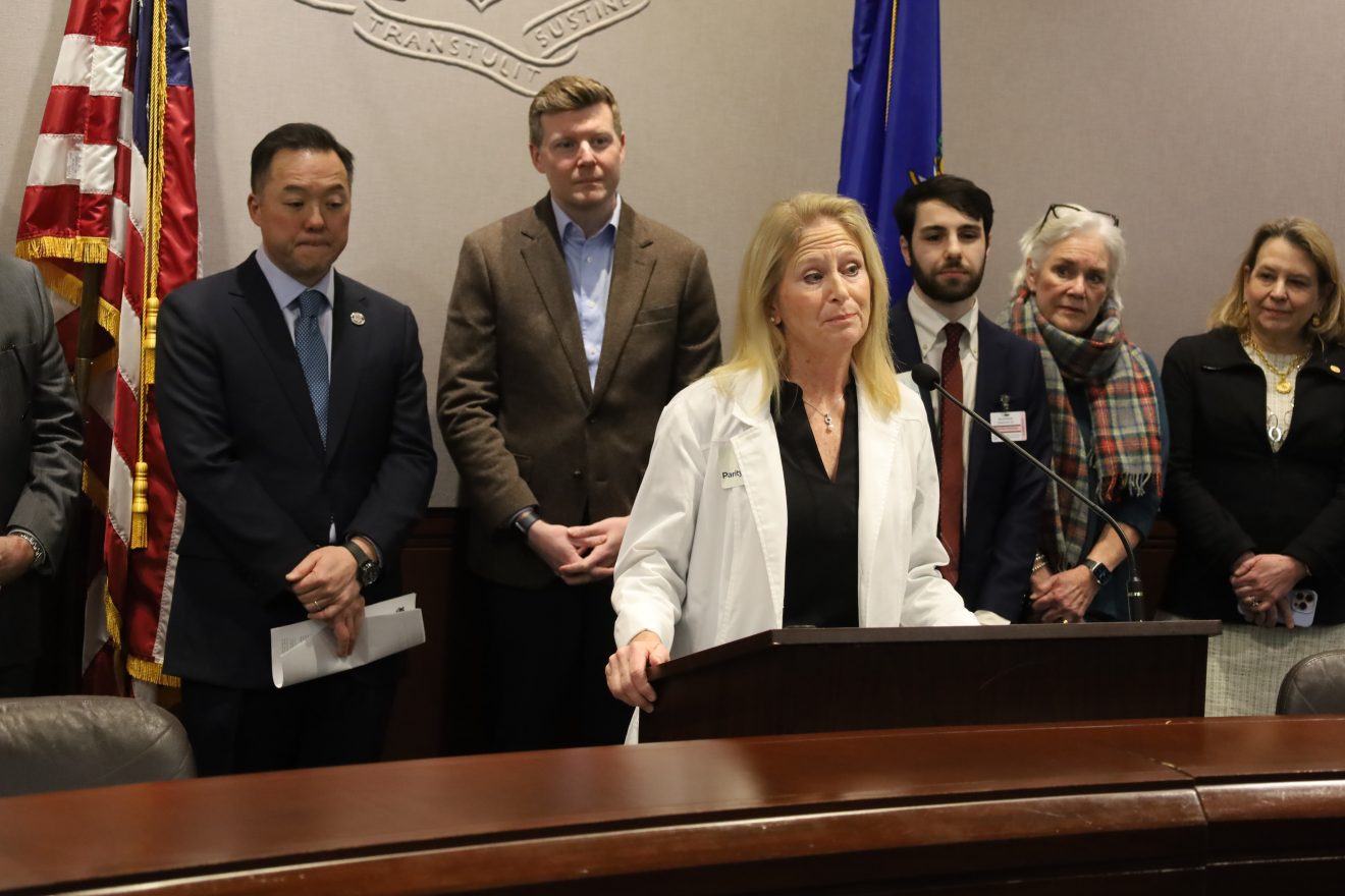 Speakers at a mental health parity press conference
